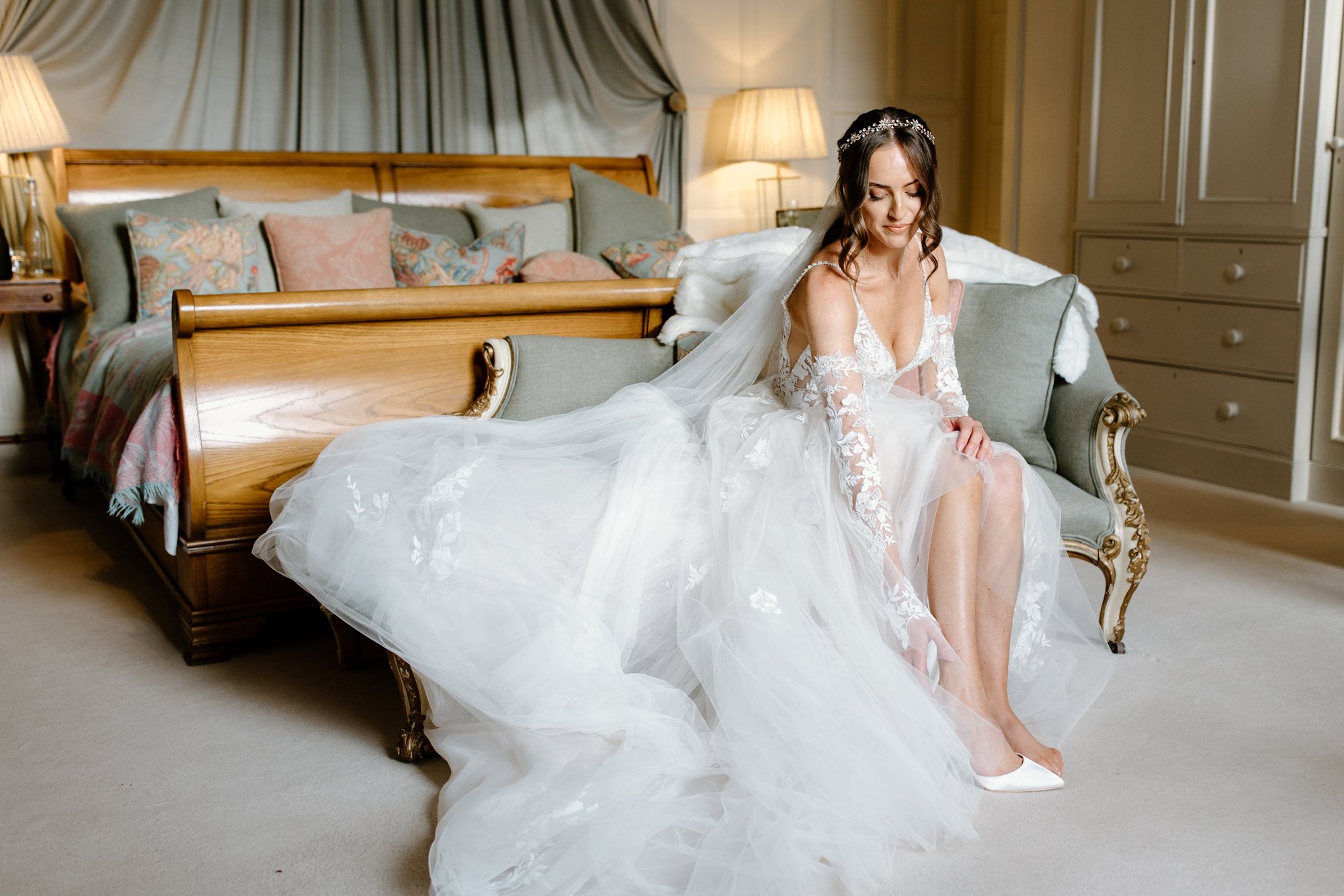 bride in a fairly tale wedding dress with a long viel