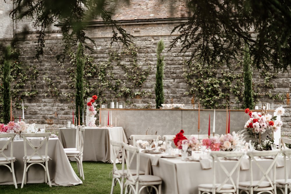 outdoor wedding banquet in the walled garden of a stately home in gloucestershire 