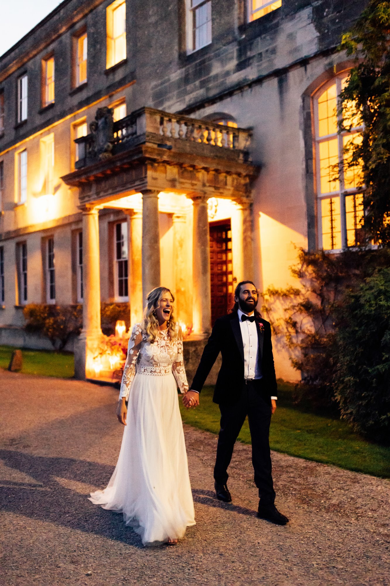 cool couple outside stately home wedding venue