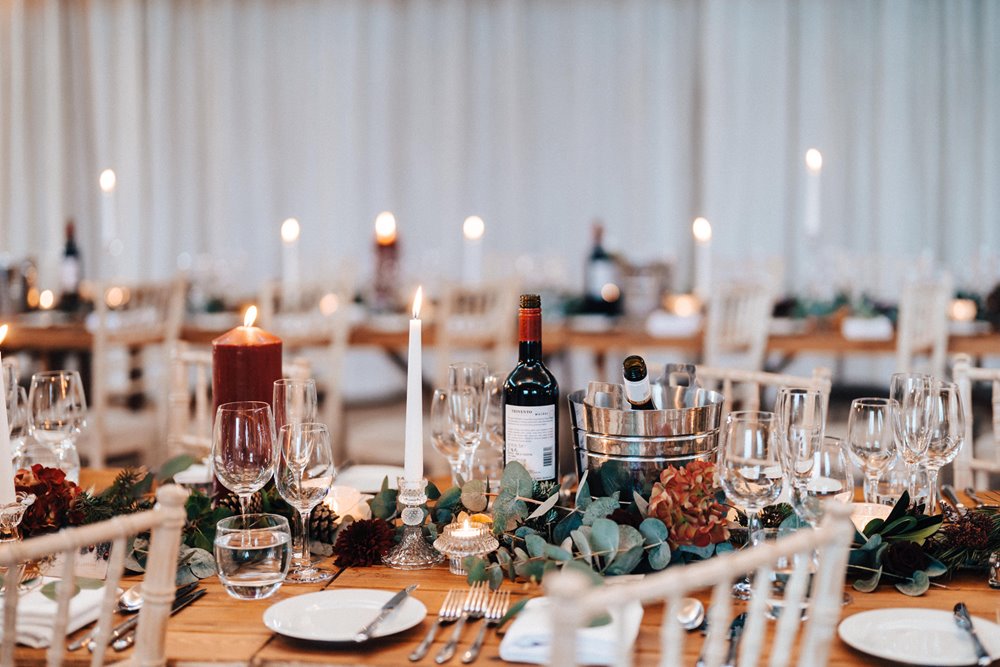 winter wedding reception with christmas decor and candles in the uk