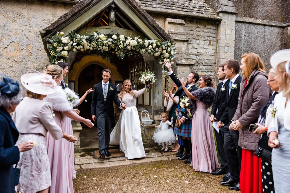Couple leave church as newlyweds from englands prettiest church