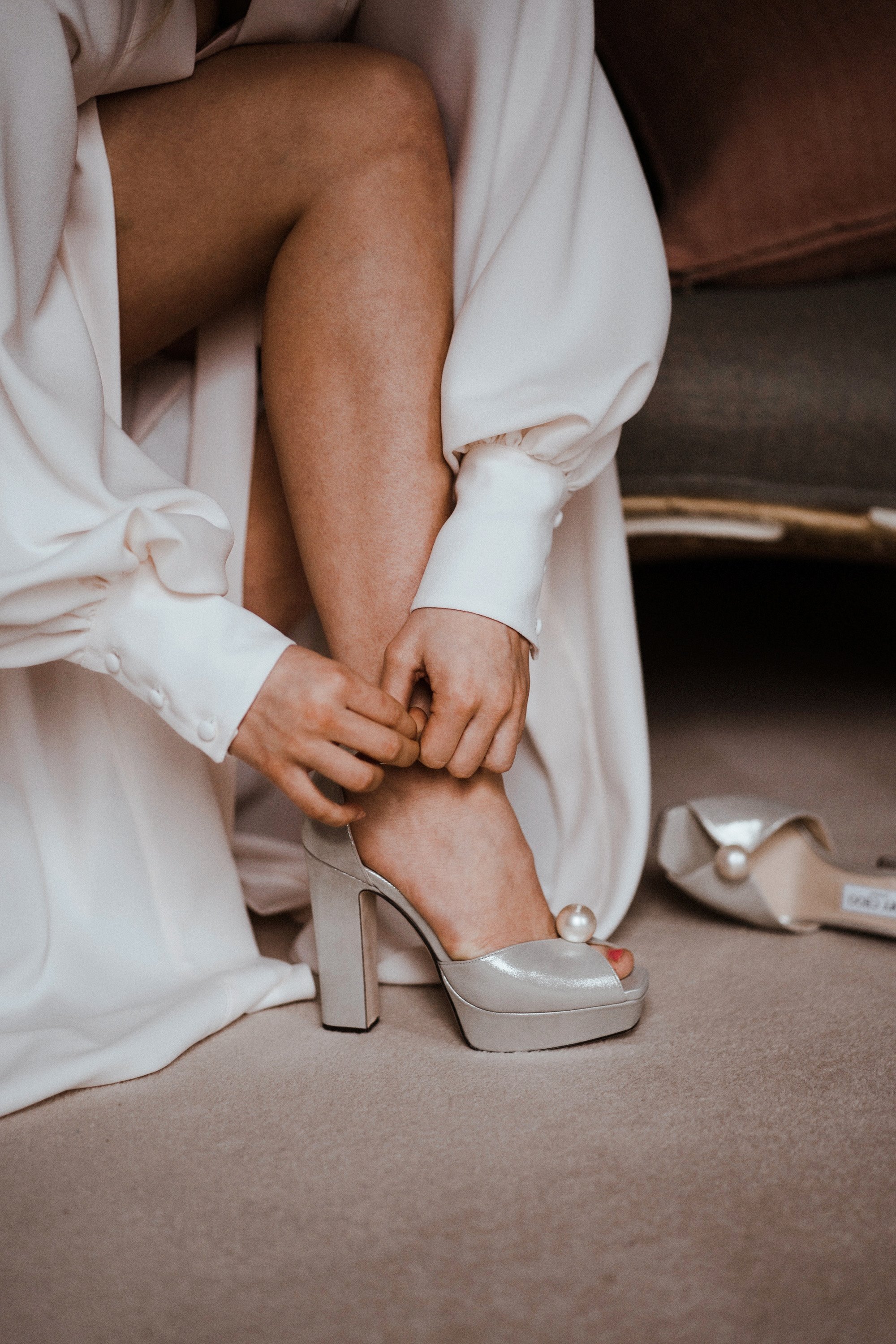 pearl bridal inspiration with jimmy choo shoes at elmore court in the cotswolds