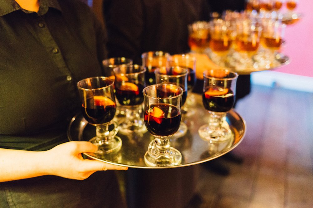 mulled wine on silver trays for a Christmas wedding