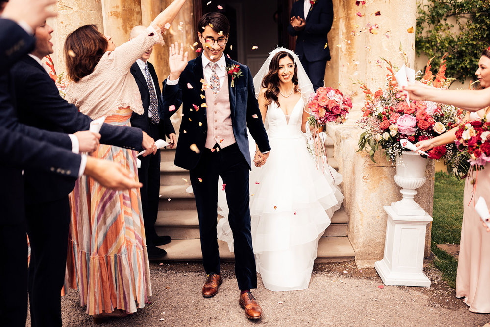 Stunning Pink & Red Wedding with 3 Dresses and a Bridesman