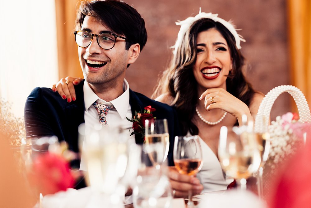 happily married couple at their wedding reception in the cotswolds