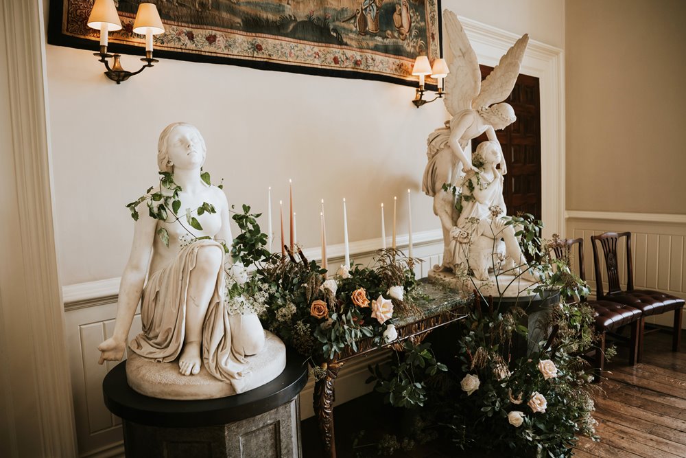 rustic wedding flowers on a table display at a wedding ceremony