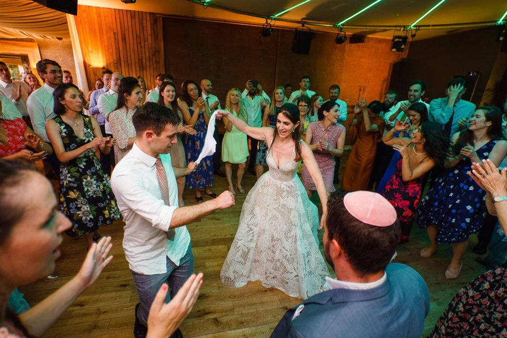 Bright & beautiful Jewish wedding with outdoor ceremony & huge party