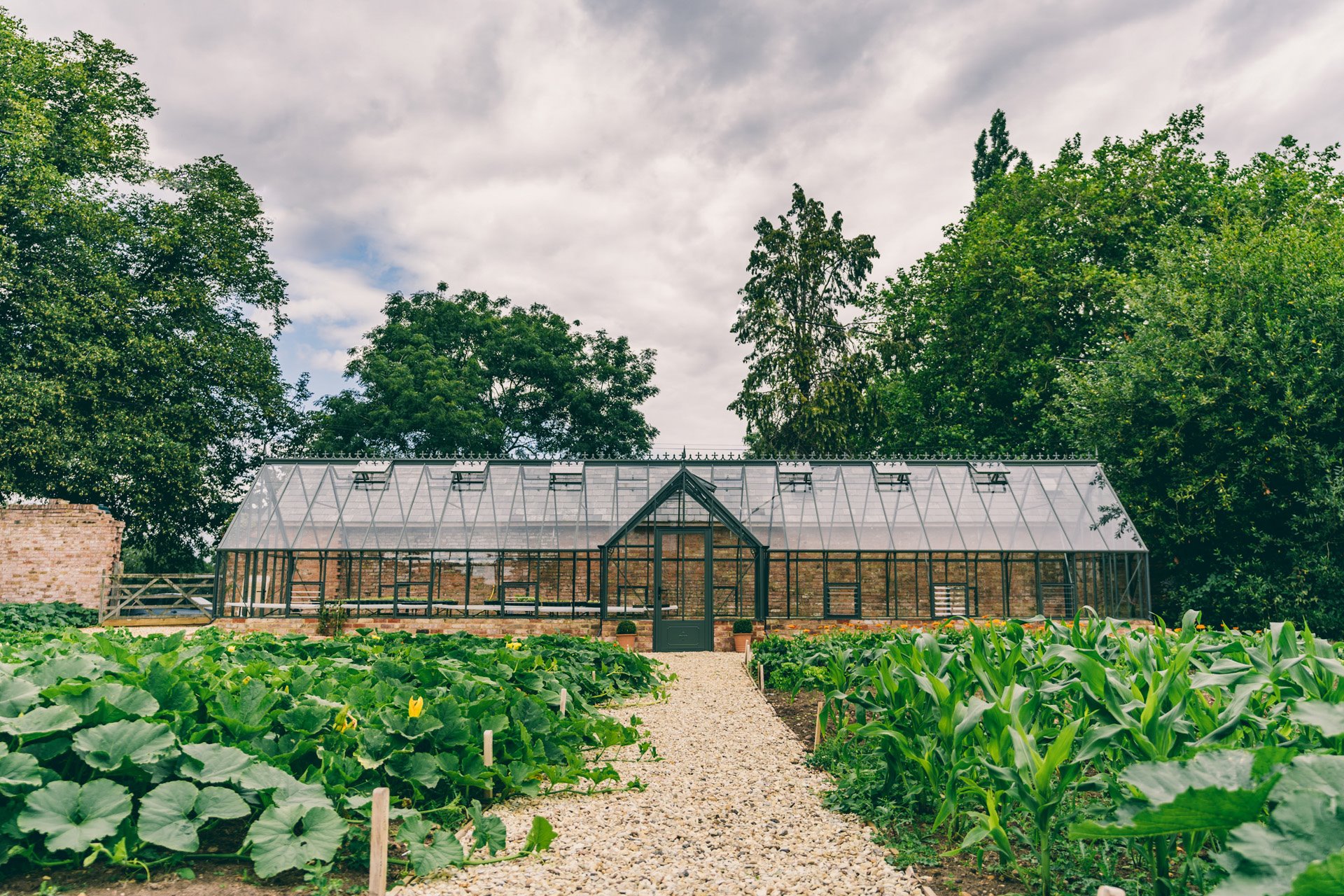 The green house in the walled garden at sustainable wedding venue elmore court