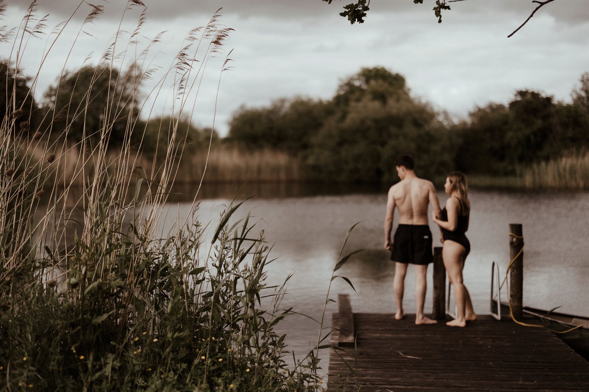 Wild swimming weddings at the spring fed lake at UK wedding venue elmore court which is rewilding part of the estate