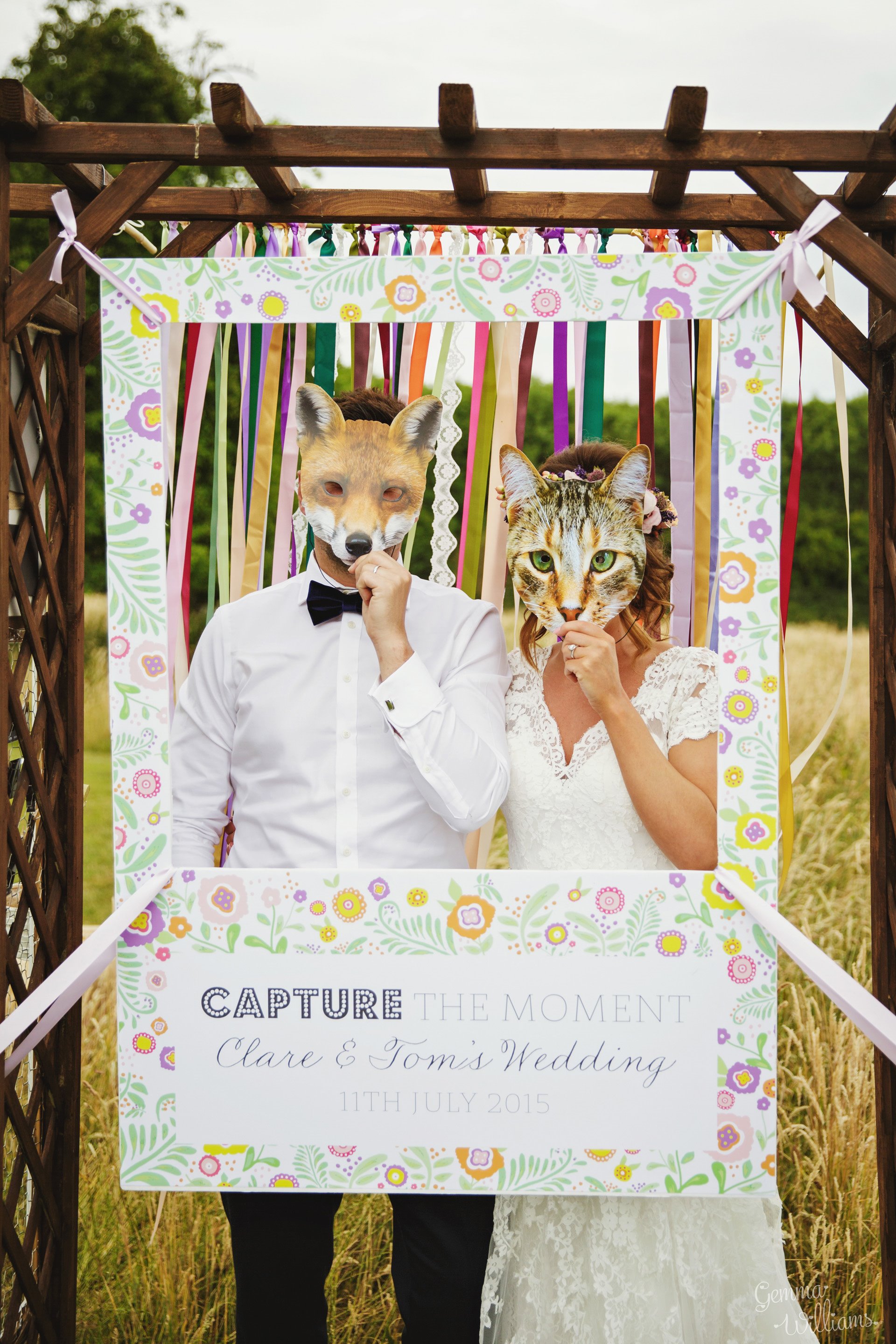 Funny outdoor wedding photo props bride and groom cat and fox masks