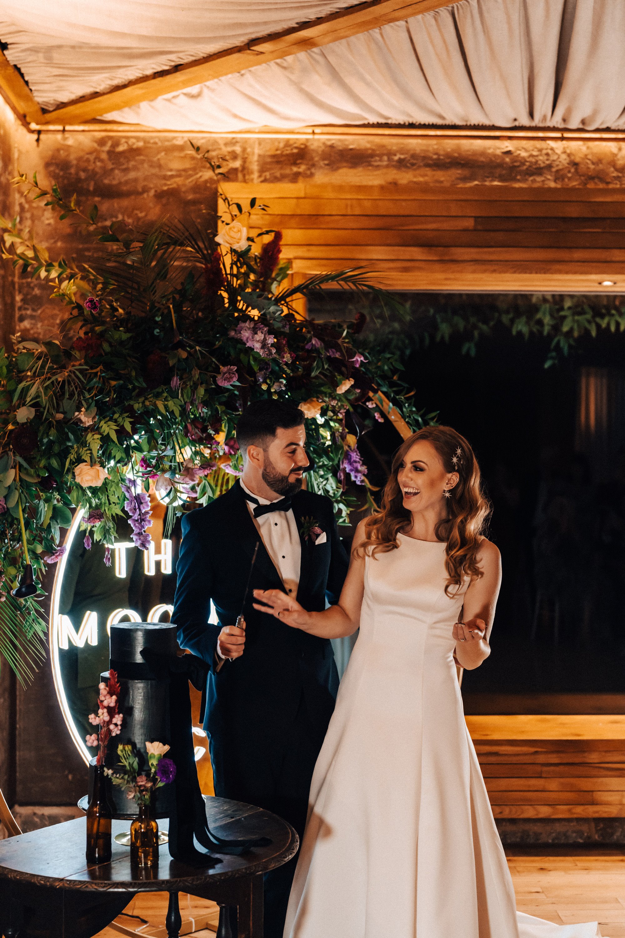 Witchy wedding ideas from a real life october wedding with black wedding cake and celestial details at sustainable wedding venue elmore court in gloucester