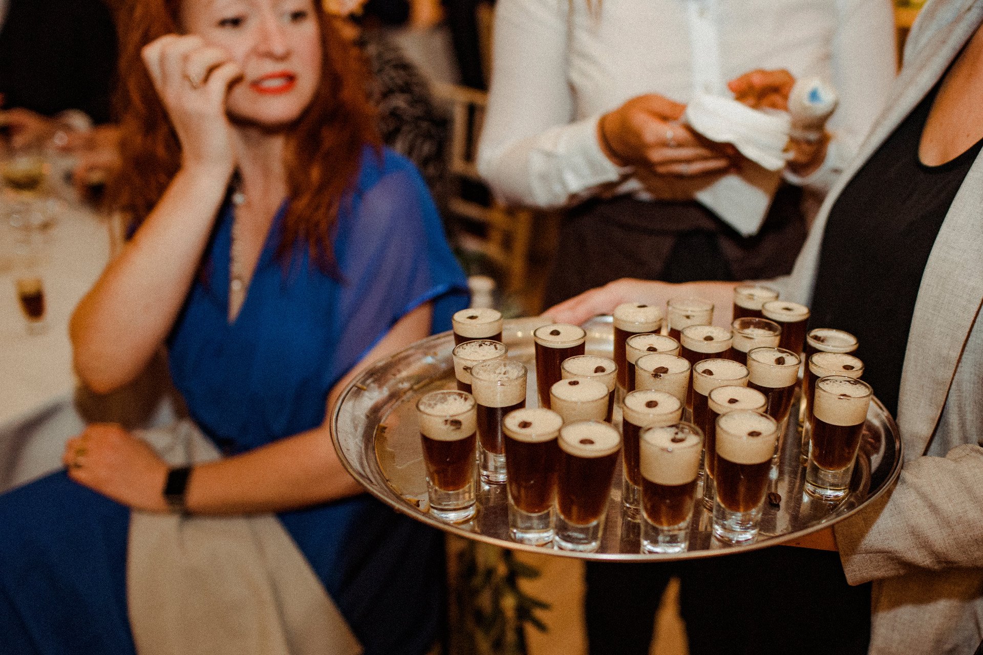 Espresso martini shots on a silver tray for a cool Autumn cocktail wedding in the Cotswolds