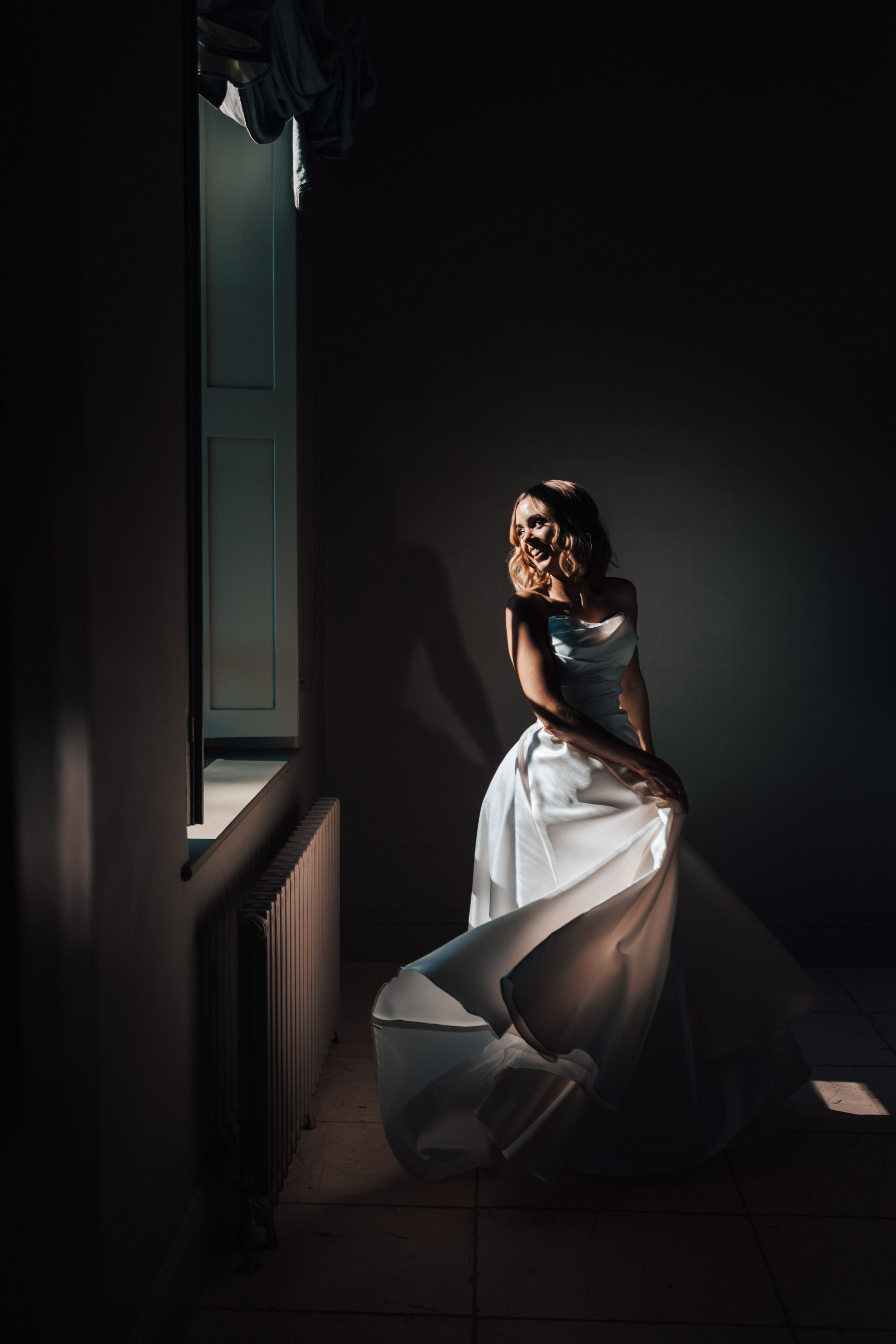 Bride in window light 