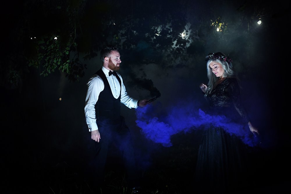 gothic couple in magical photoshoot for witchy wedding inspired by halloween and hocus pocus