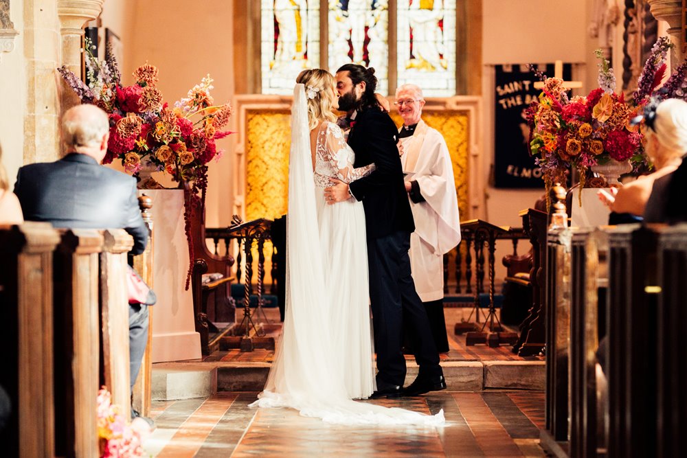 colourful wedding in a beautiful church in gloucestershire