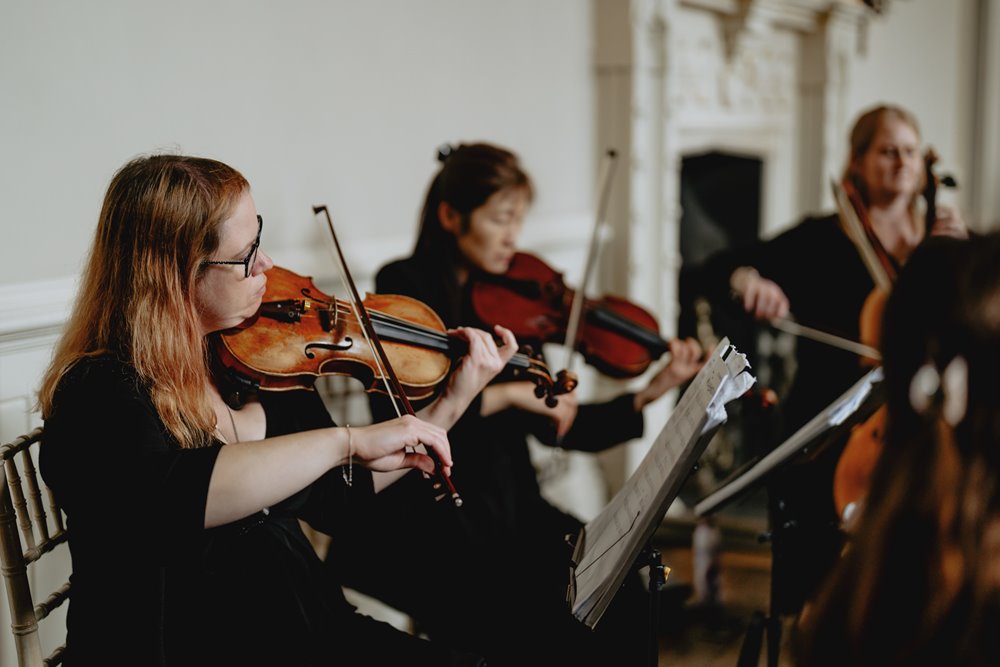 Wedding string quartet Nero playing at stately home venue elmore court in Gloucestershire 