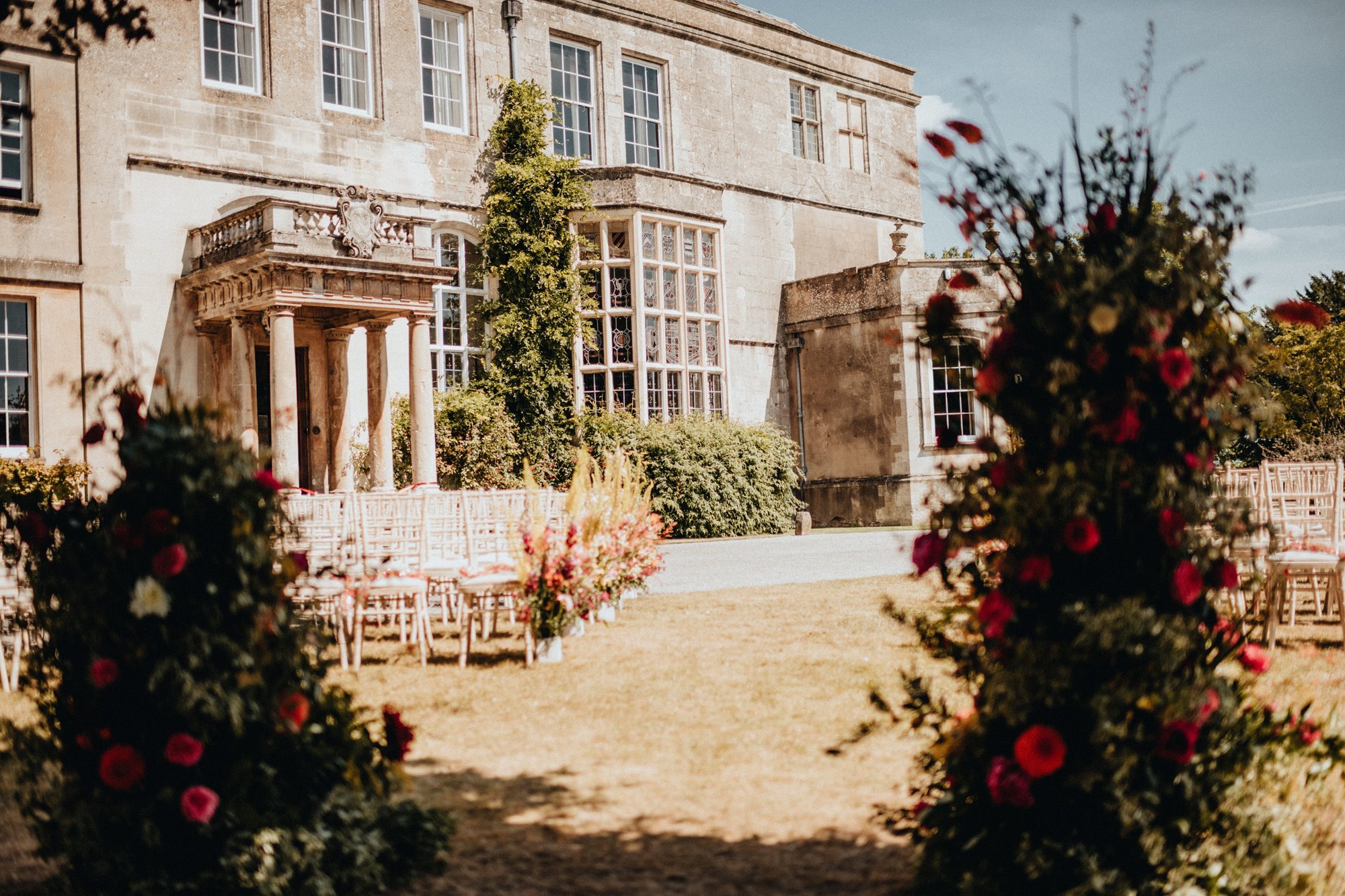 Beautiful outdoor wedding ceremony in summer at Elmore Court