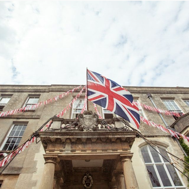 Union jack flag flying on one of England's oldest family homes, mansion house elmore court in Gloucester is now a popular party wedding venue