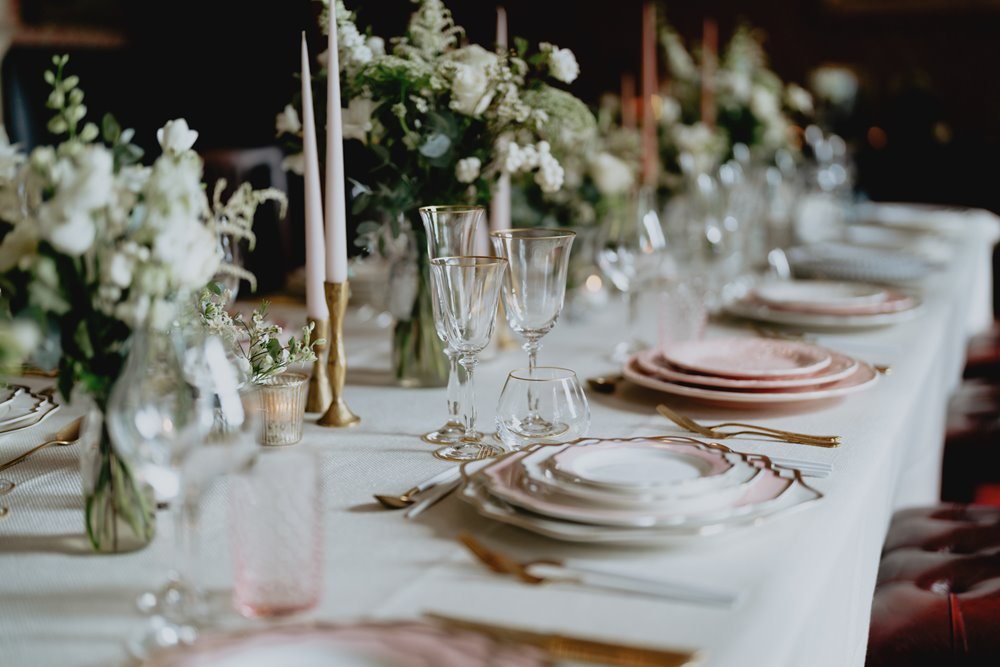 Modern luxe wedding details in blush and neutral colours on tables