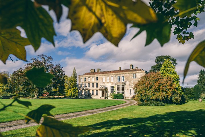 Stately home elmore court framed by autumn leaves. As the winter draws in there is hope and love and pop up events galore in the Cotswolds
