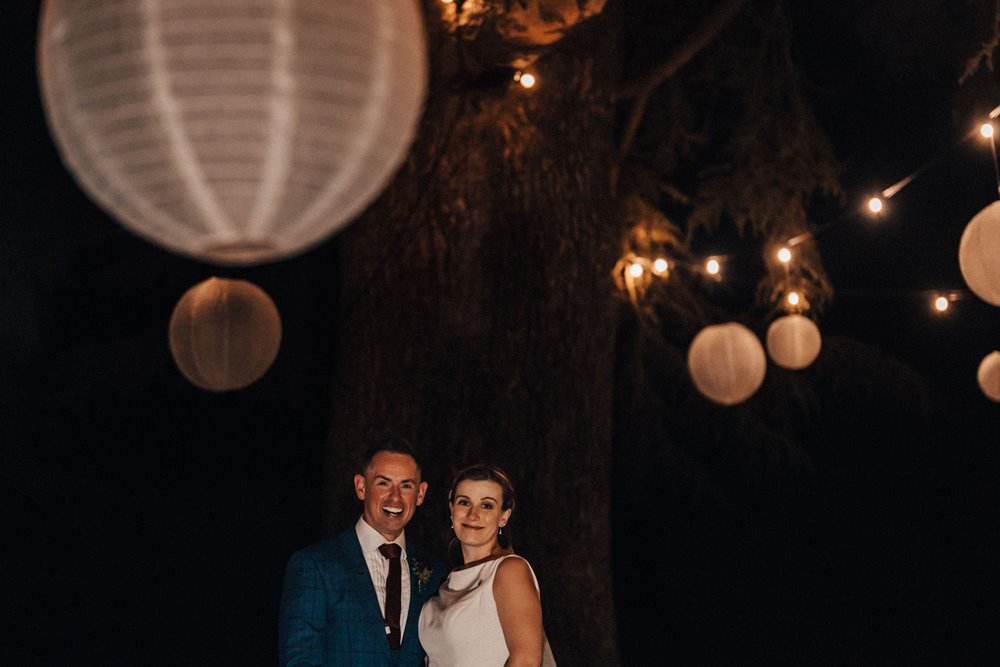 christmas wedding magic with lanterns in the trees 