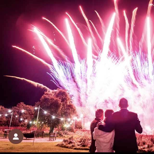 Bonfire wedding with fireworks and outdoor fire at winter wedding venue elmore court