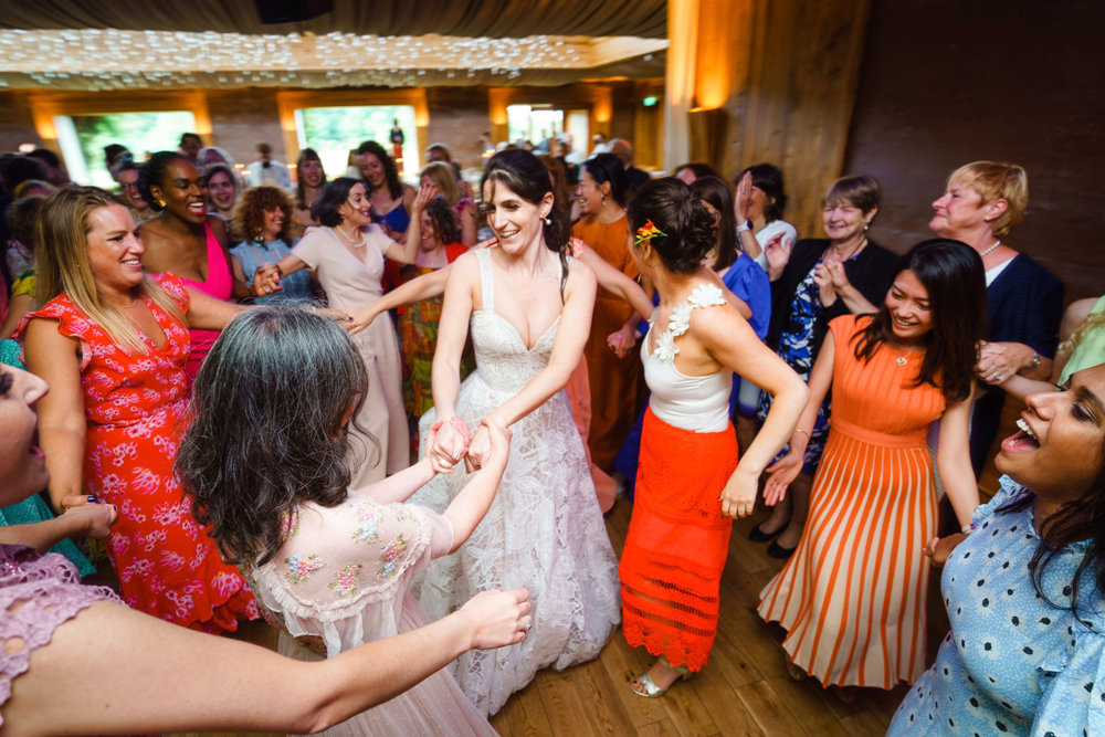 Bright & beautiful Jewish wedding with outdoor ceremony & huge party