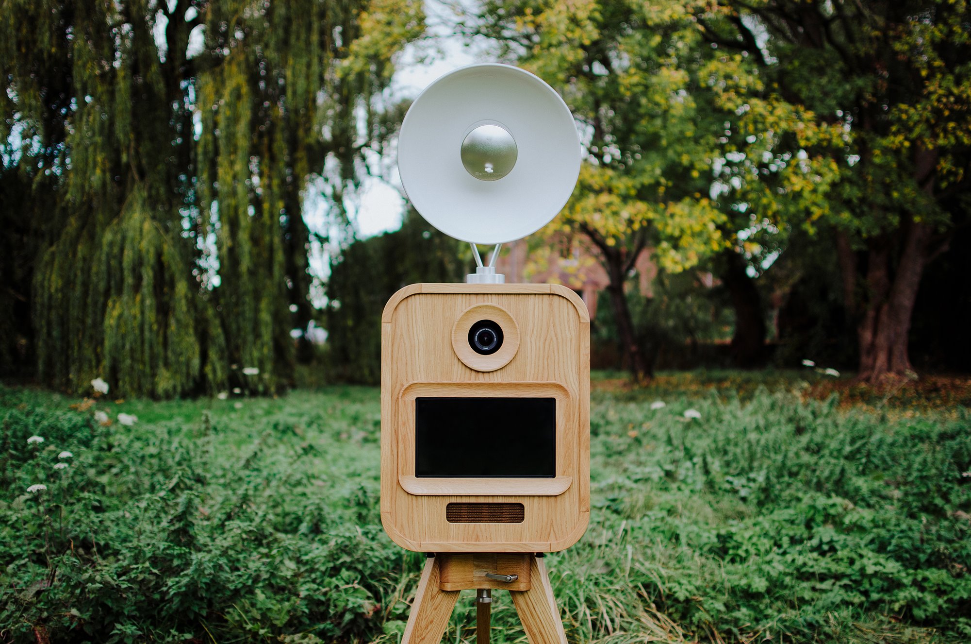 Mid century modern photo booth in a field for a wedding