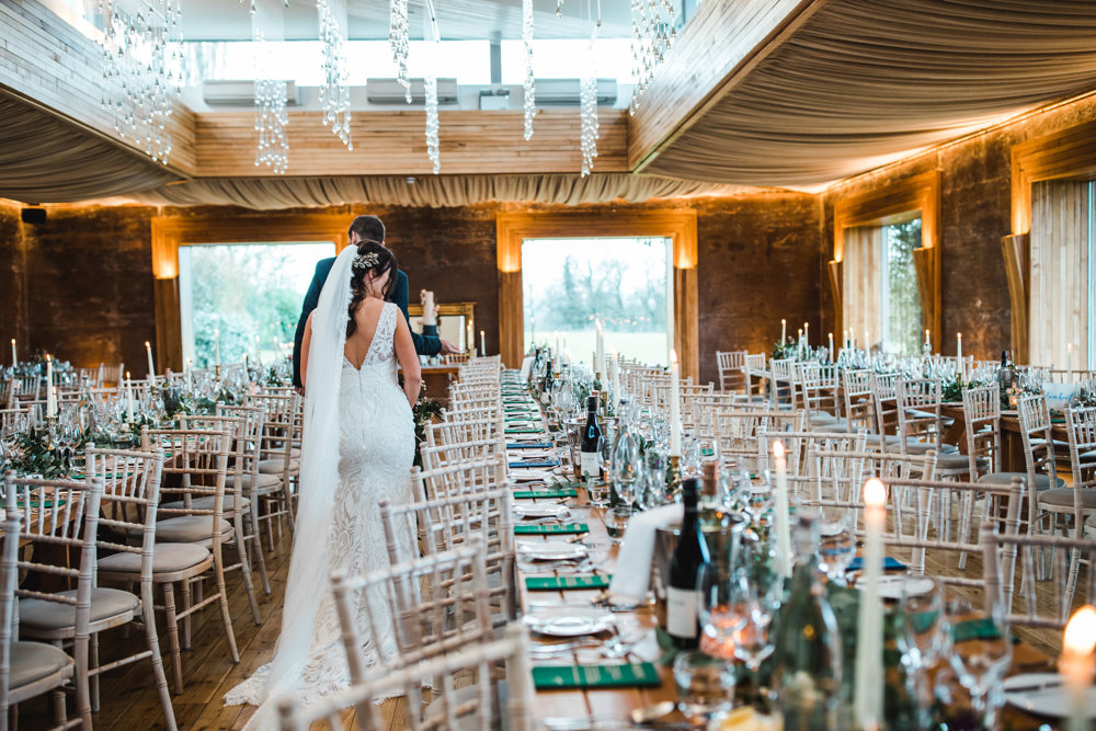 Big wedding reception styled ready to sit down for dinner