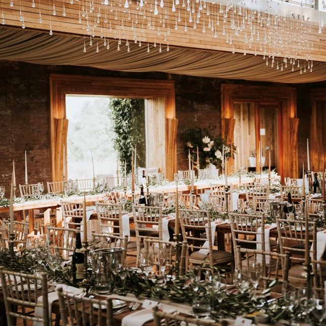 Romantic Winter wedding reception in a beautiful light and airy eco venue in the cotswolds