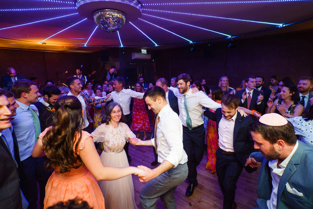 Bright & beautiful Jewish wedding with outdoor ceremony & huge party