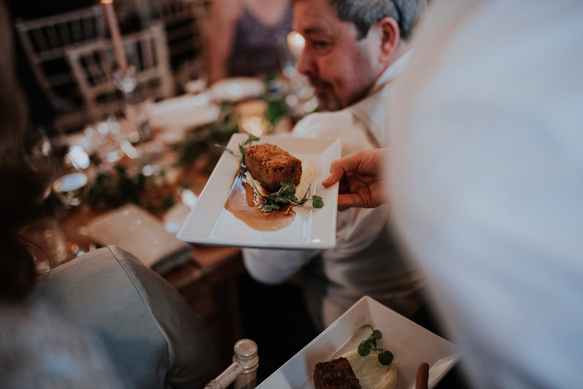 Delicious food being served to a table at a Unique dining experience in a secret restaurant and cabaret club in a Cotswolds mansion house