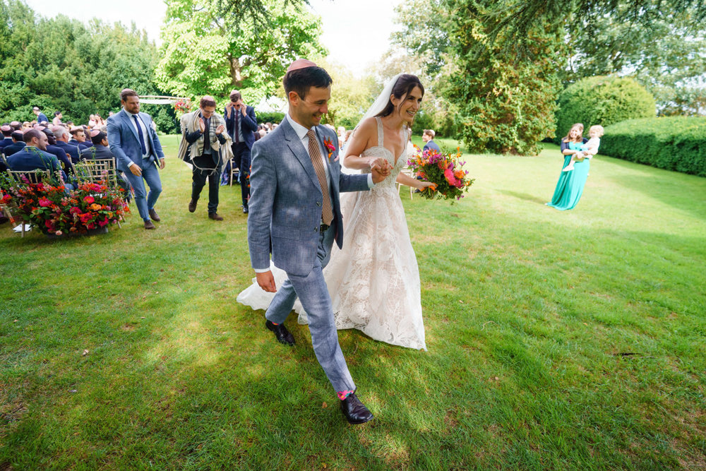 Bright & beautiful Jewish wedding with outdoor ceremony & huge party