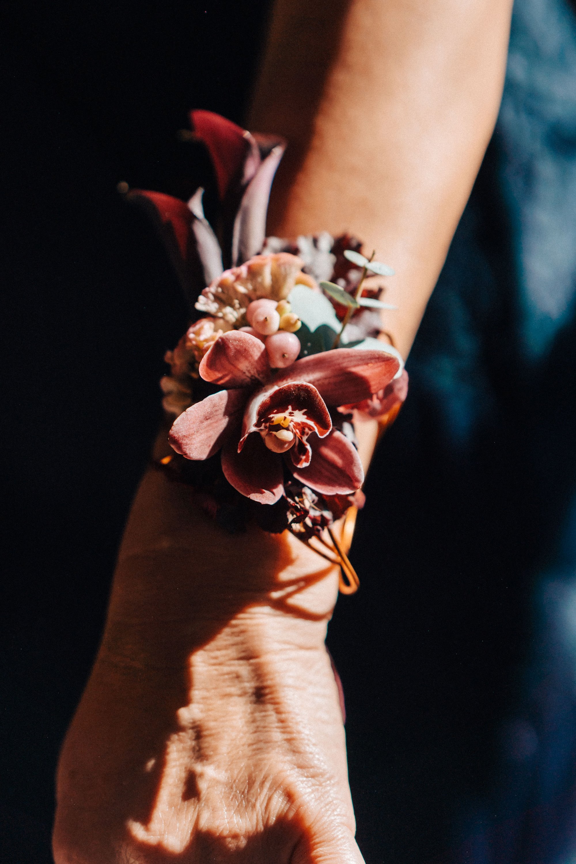 Autumn wedding corsage in beautiful light for an october wedding in the cotswolds countryside