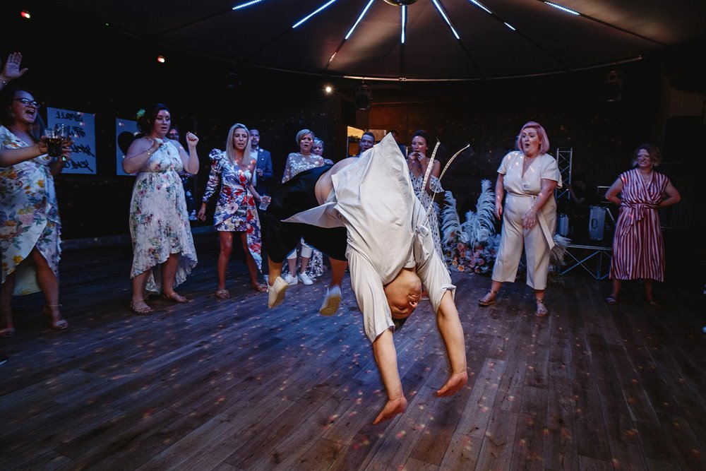 Crazy dance moves at party wedding at elmore court
