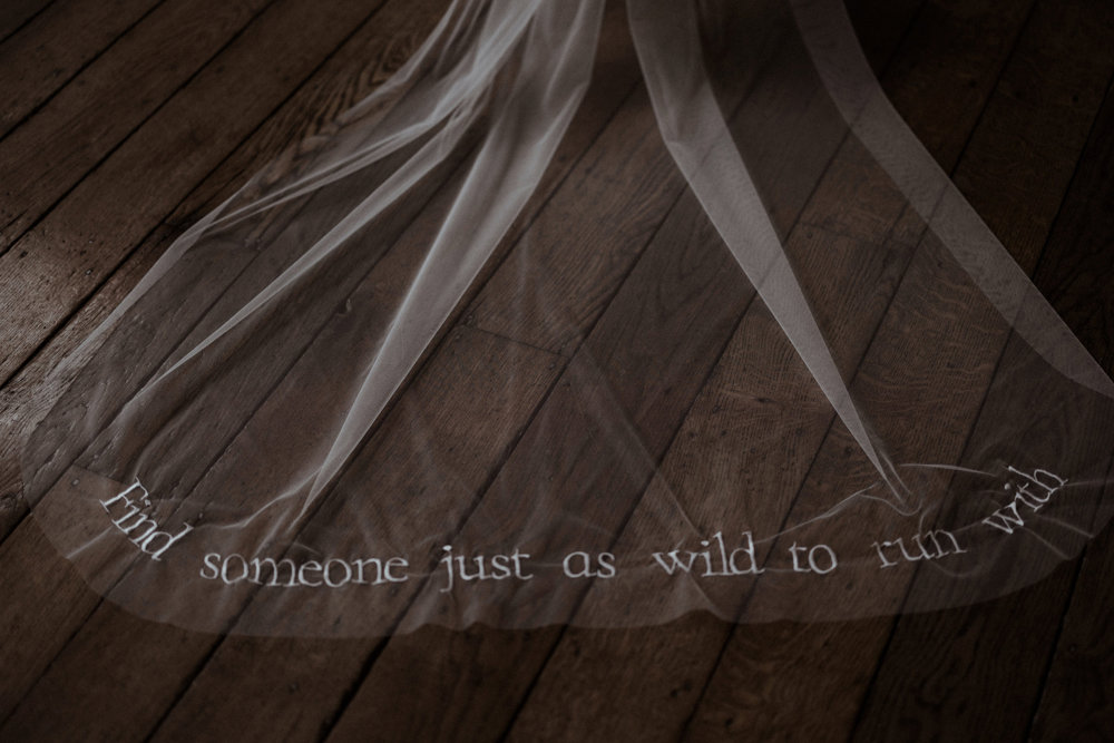 Wild wedding inspiration veil featuring words find someone just as wild to run with
