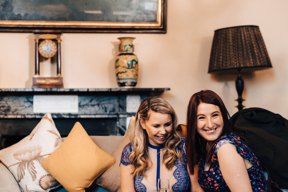 laughing guests having fun at drinks reception