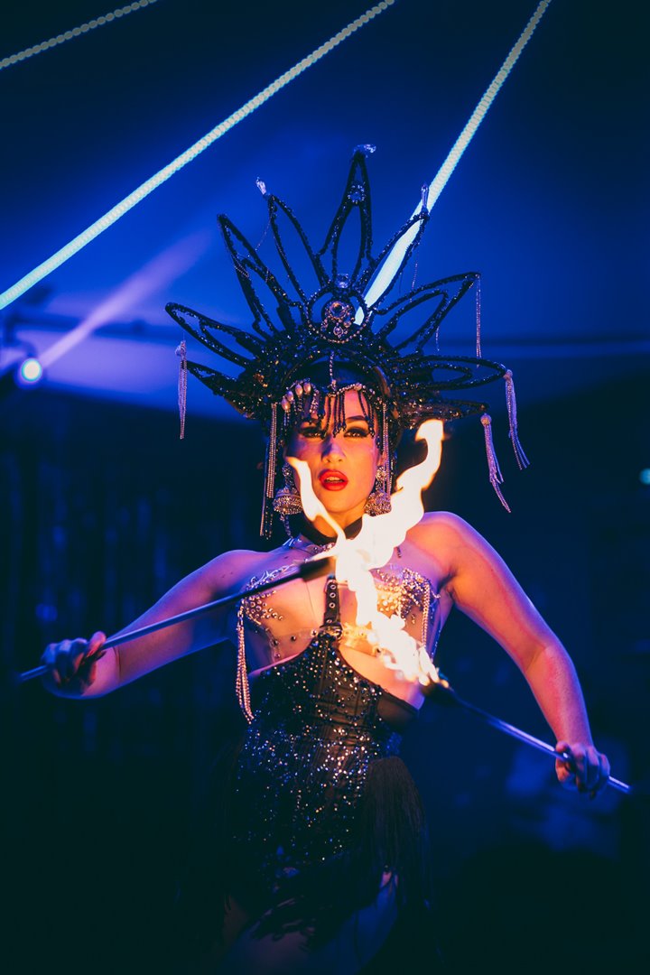 Fire performance for festival weddings and christmas parties by burlesque Missy fatale