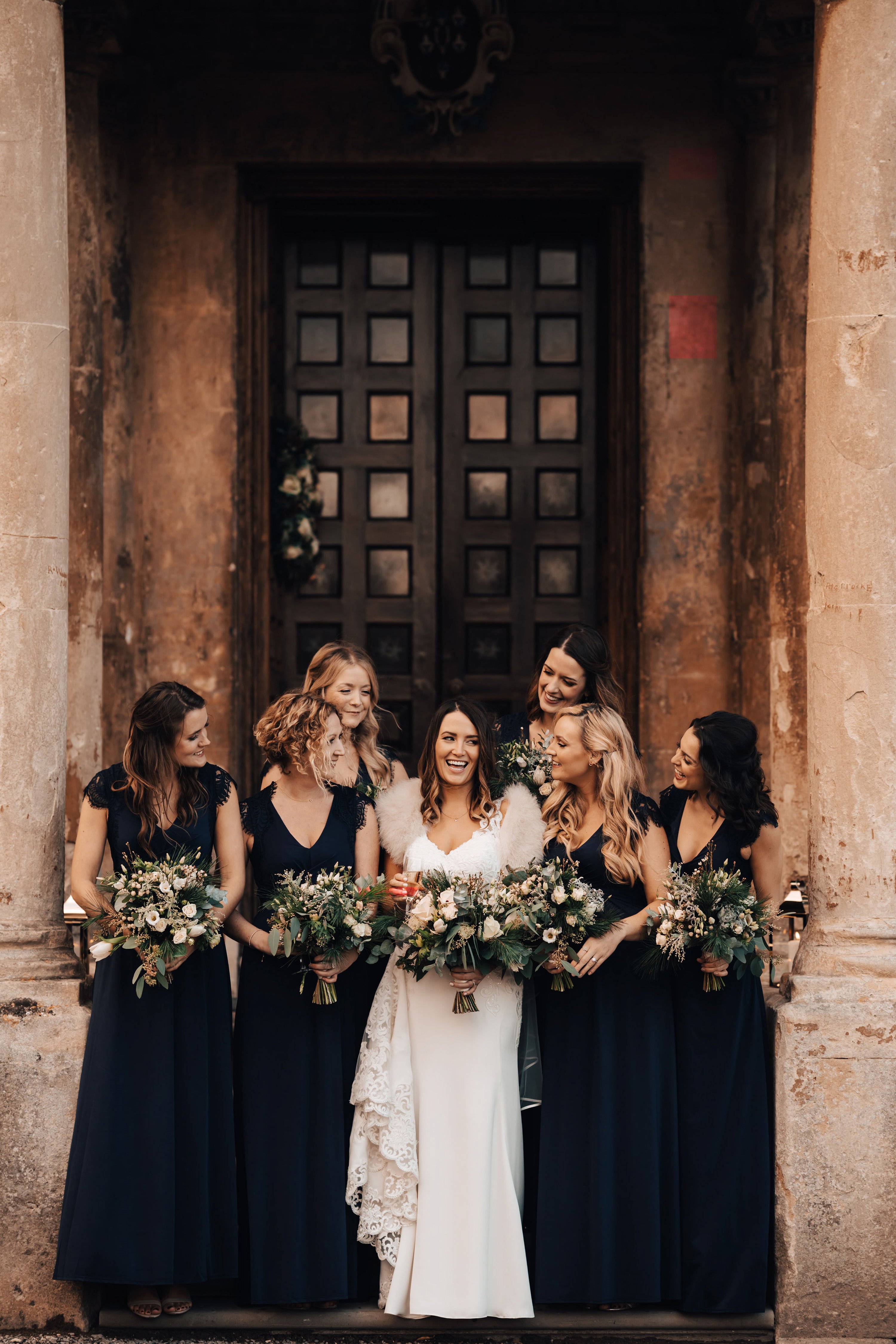 Black bridesmaids dresses at an autumn wedding at elmore court