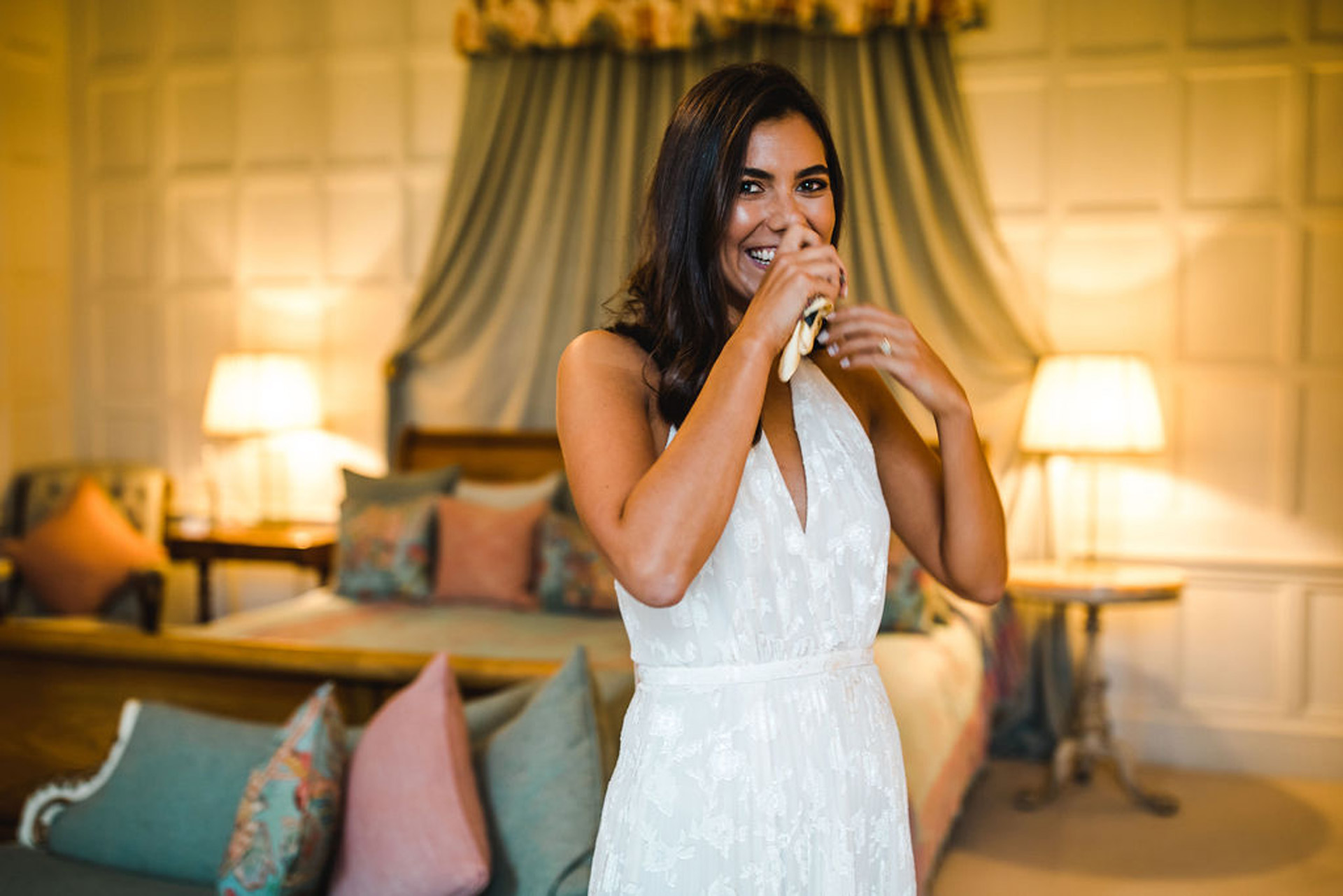 Emotional bride getting ready for micro wedding ceremony at elmore court