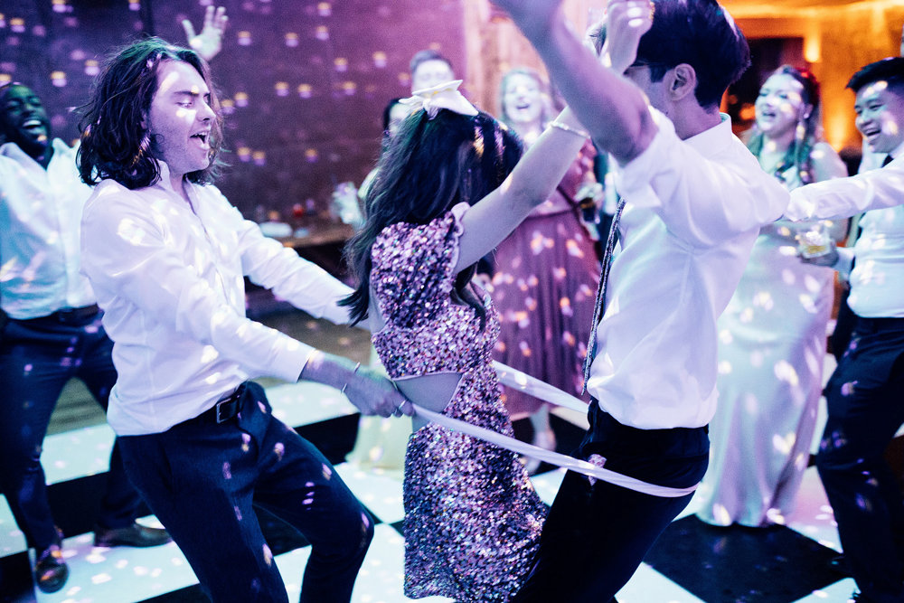 Stunning Pink & Red Wedding with 3 Dresses and a Bridesman