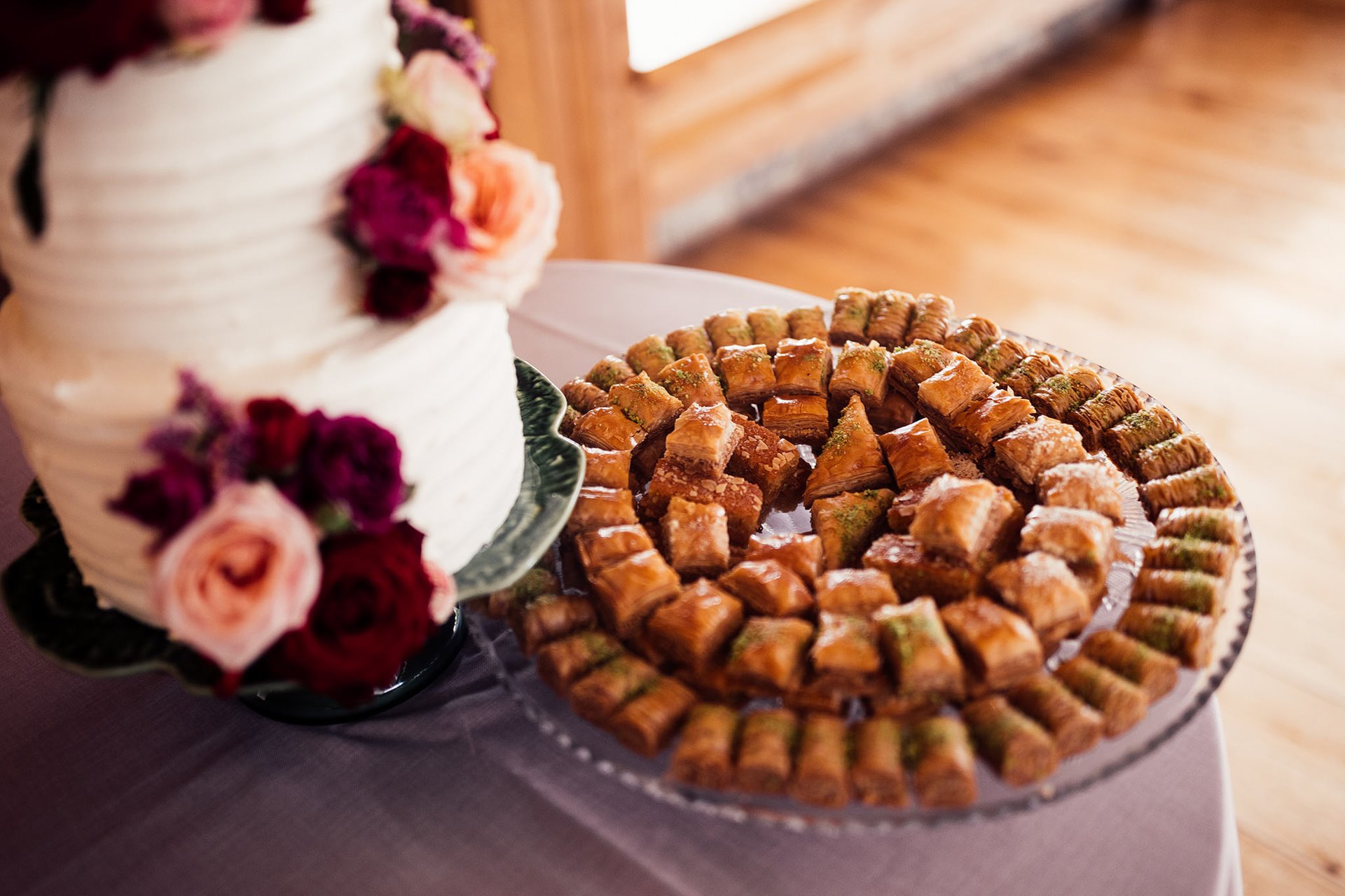 Iranian wedding food and beautiful three tier wedding cake at cotswolds wedding reception
