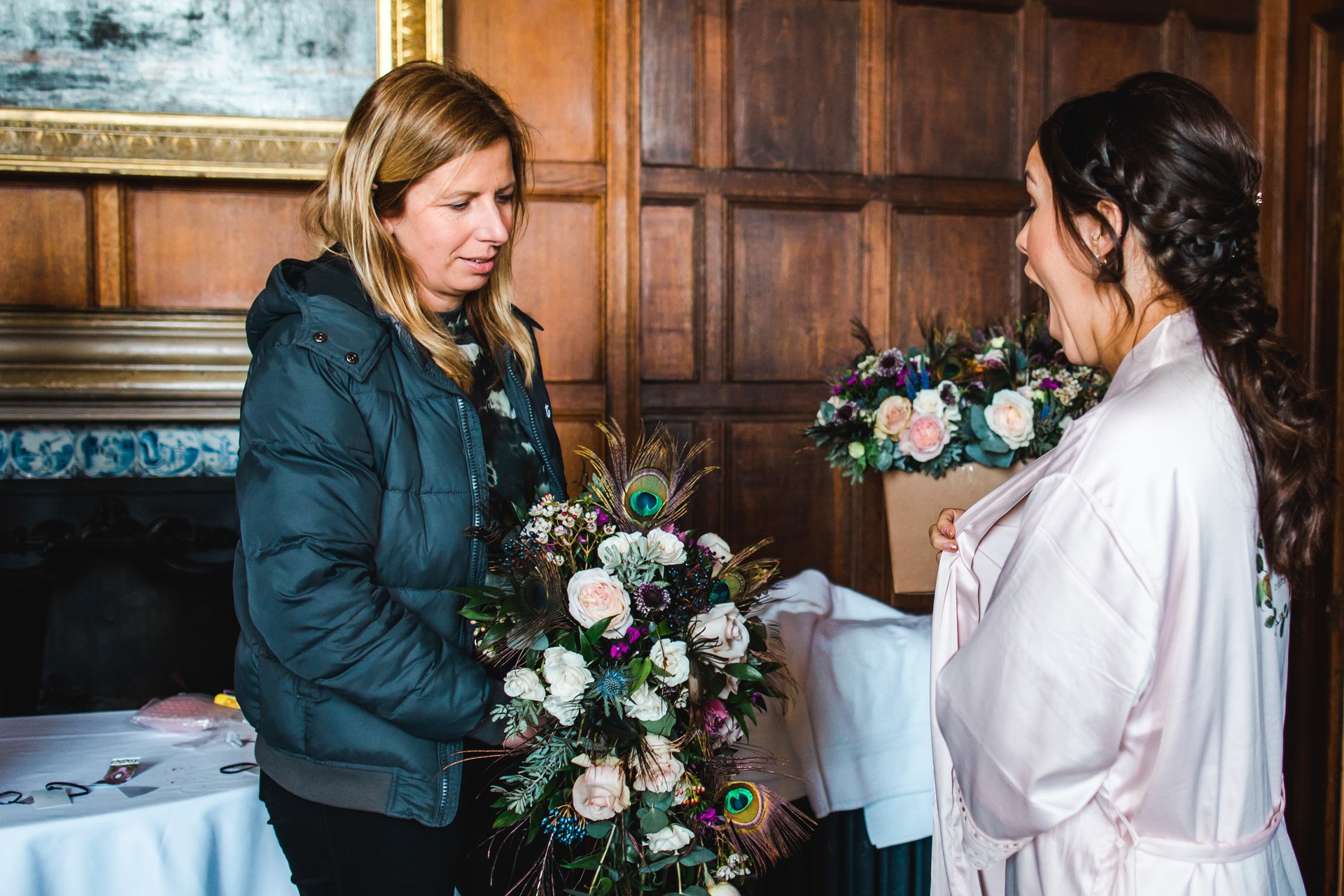 Sorori design wedding florist showing the bride her beautiful bouquet for the first time