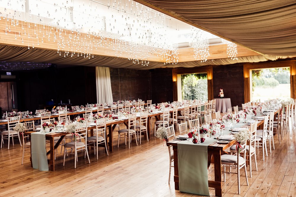 The gillyflower at elmore court decorated with pink and red for a fun wedding