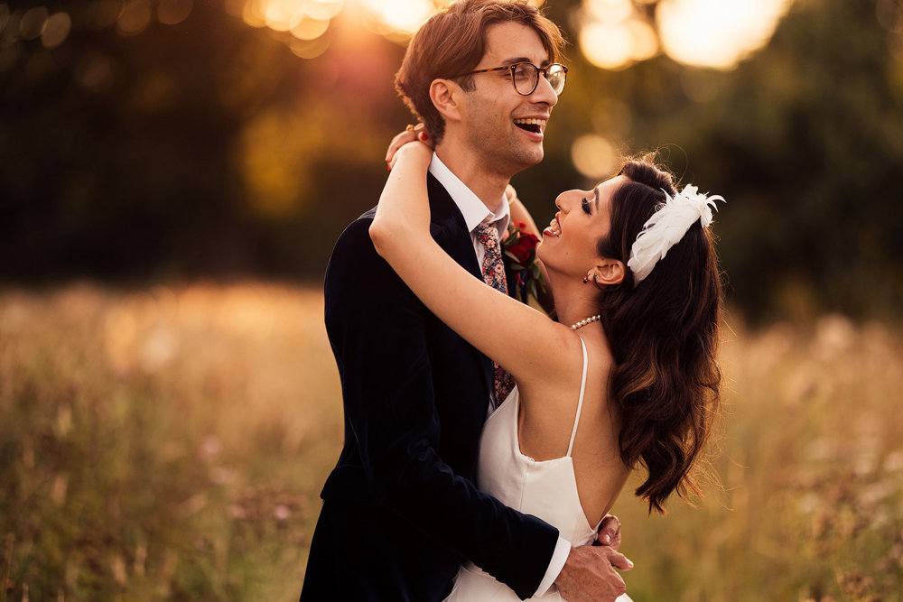 Stunning Pink & Red Wedding with 3 Dresses and a Bridesman