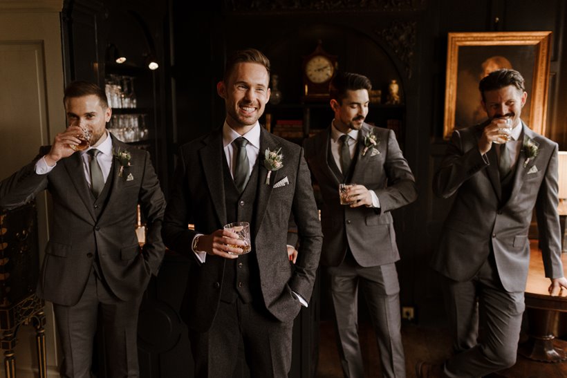 Cool groomsmen at september wedding in stately home