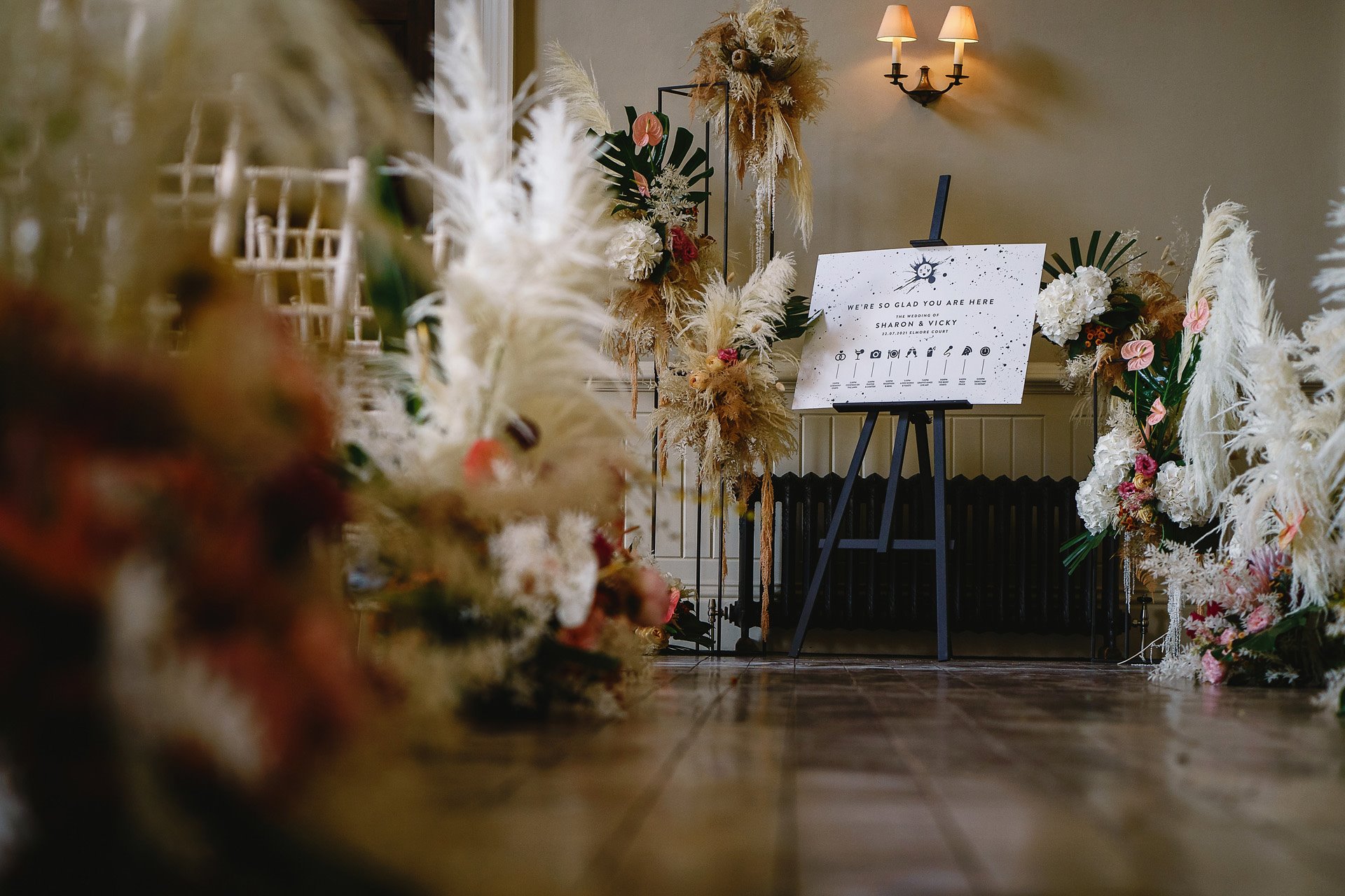 Pampas grass wedding aisle decor for a lesbian wedding at elmore court by Studio Sorores