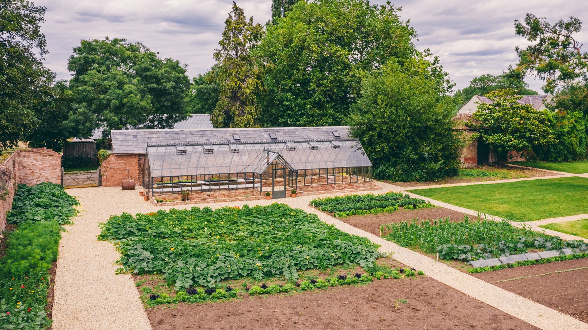 Walled garden and glass house from above. All events at elmore court include home grown food