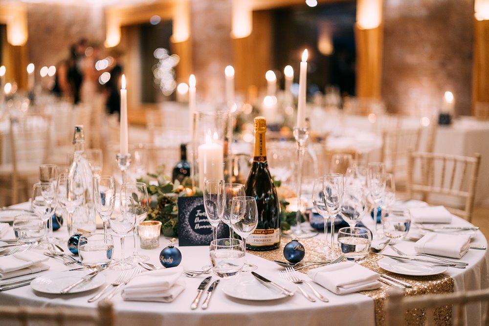 Christmas wedding table laid out for reception in the gillyflower at elmore court