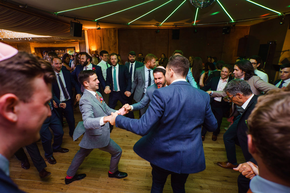 Bright & beautiful Jewish wedding with outdoor ceremony & huge party